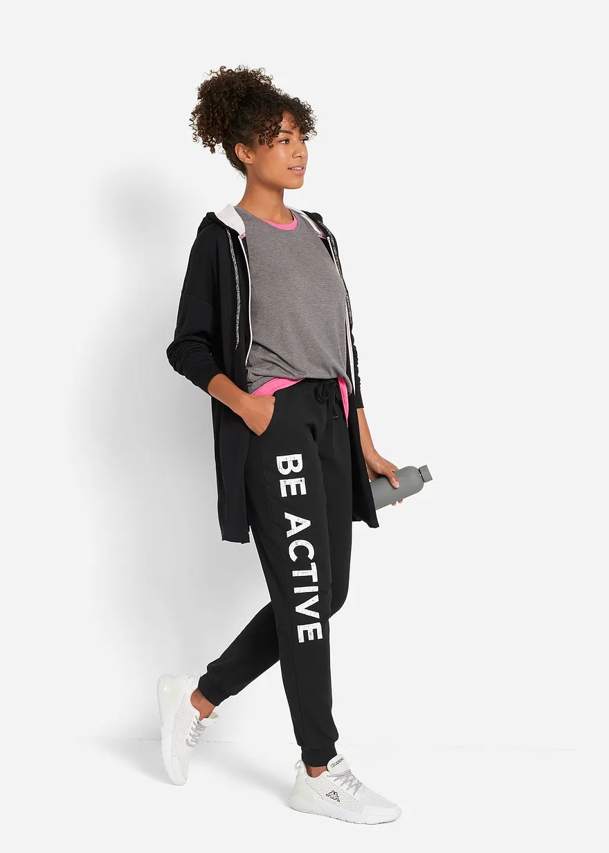 Bonprix Weite Baumwoll-Jogginghose Aus Einem Stretch-Material Mit Eingriffstaschen Und Motivierendem Aufdruck