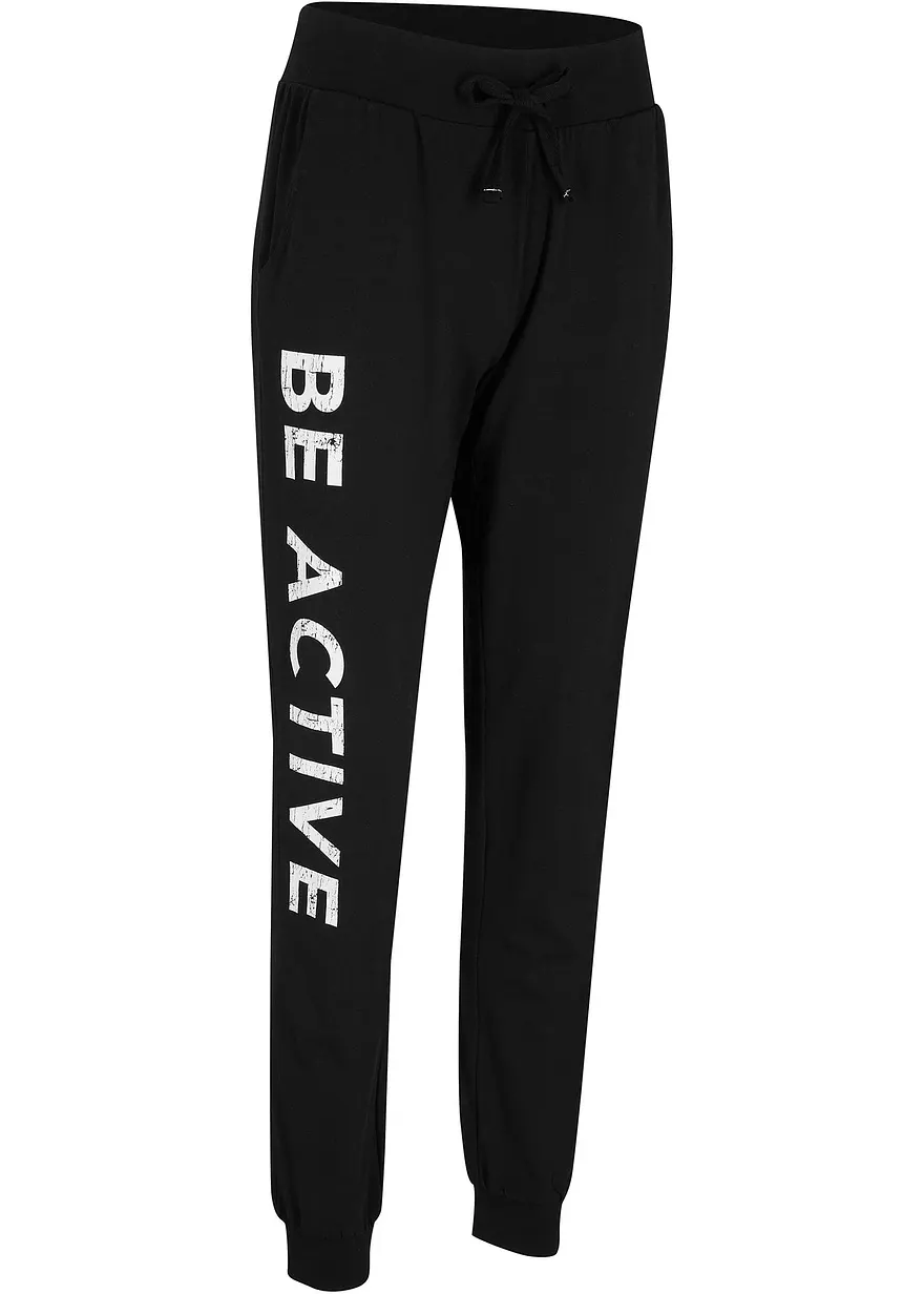 bonprix Weite Baumwoll-Jogginghose aus einem Stretch-Material mit Eingriffstaschen und motivierendem Aufdruck